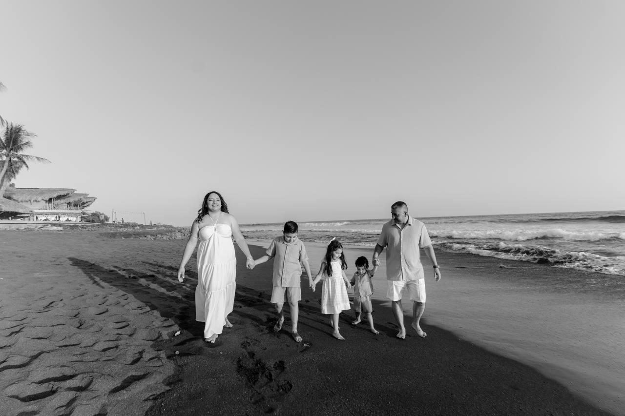 Family walking black and white